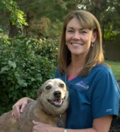 Kristin holding a dog